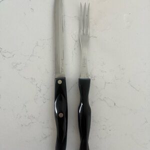 CUTCO SET 
craving knife and serving fork.